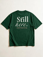 Still Here Bottle Green - Product flat lay back