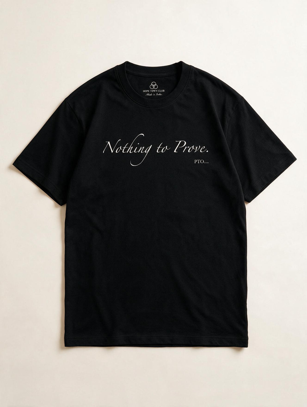 Nothing to Prove Black - Product flat lay with neck label