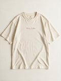 Nothing to Prove Nowhere to Be Off White - Product flat lay with logo and neck label